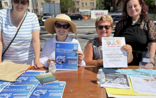 HICC staff promoting the program oudoors