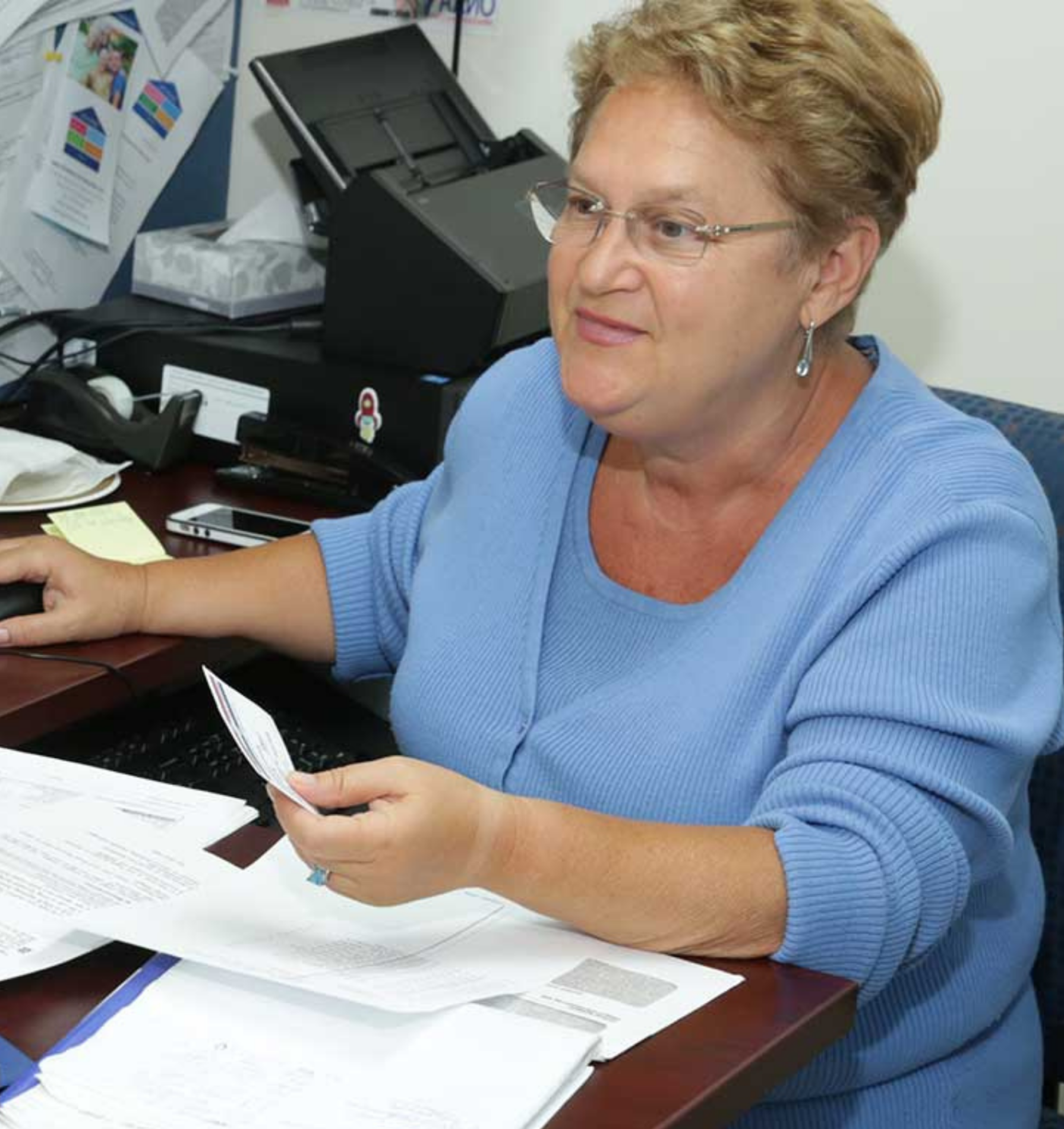 Veronica Beres, HICC Director, talking to a client