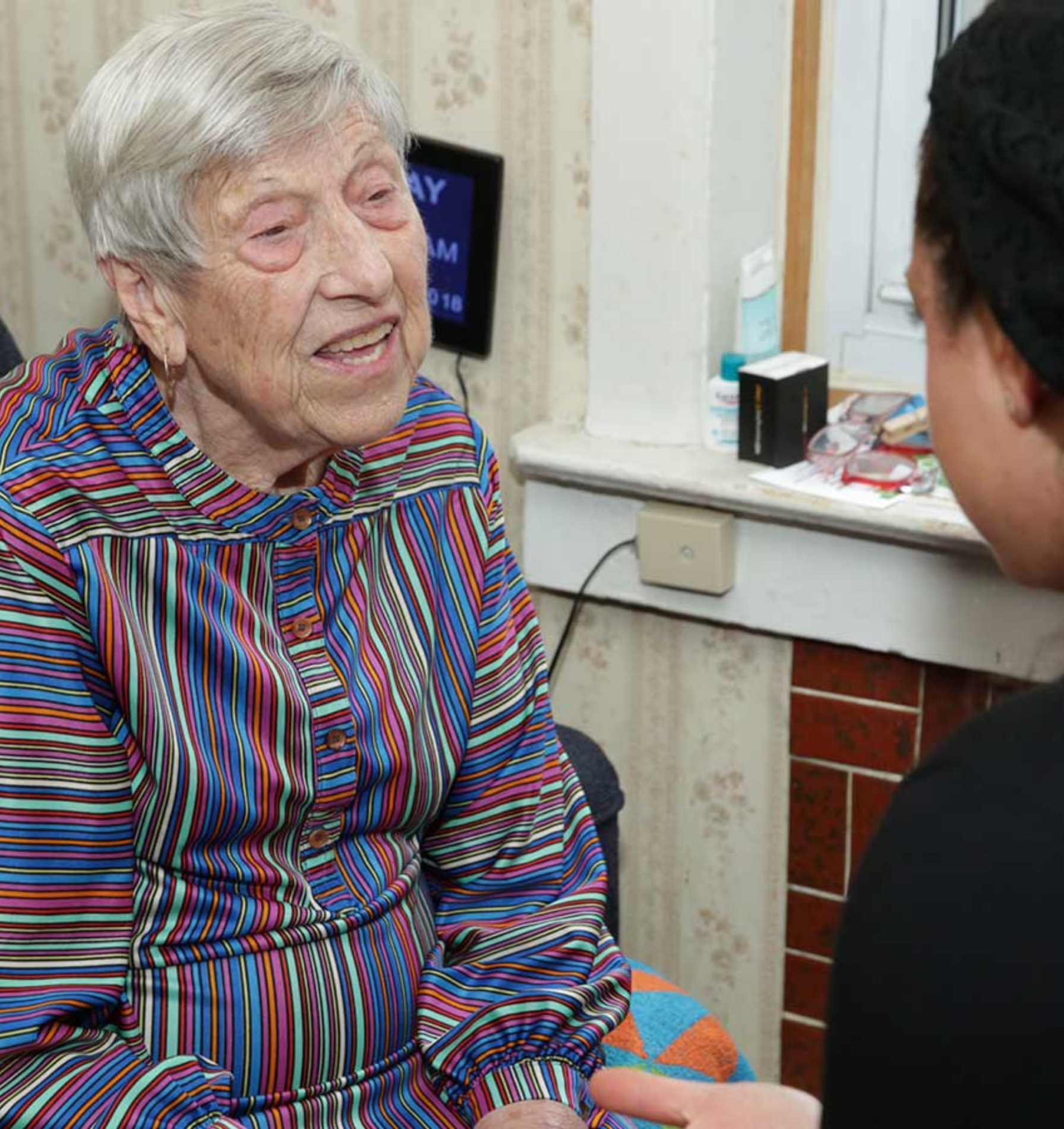 Doctor speaking with a client