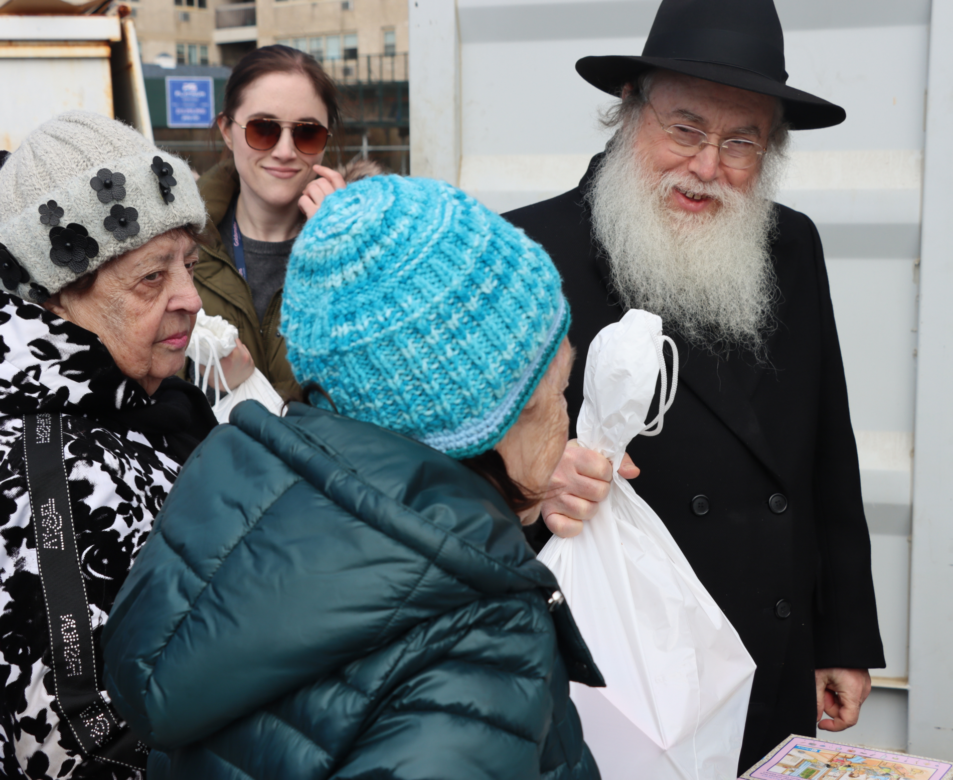 225 Exec Director Rabbi Wiener handing out food