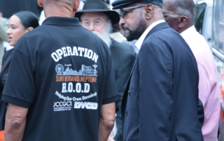 community leaders speaking together