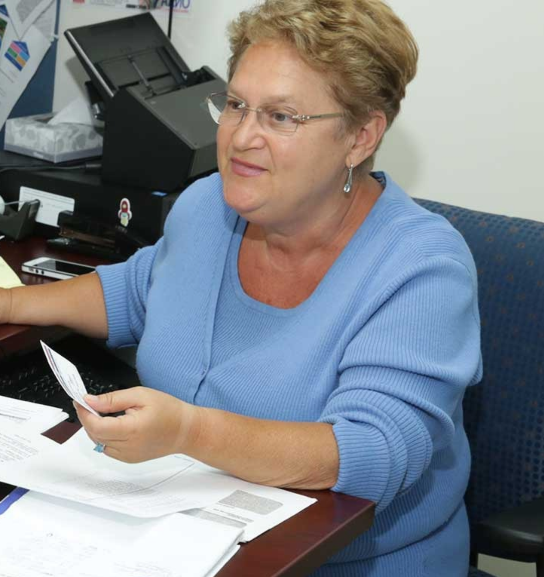Veronica Beres, HICC Director, talking to a client