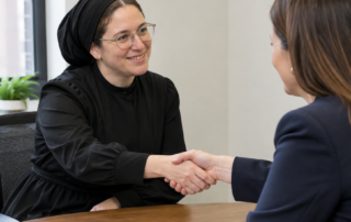Women shaking hands