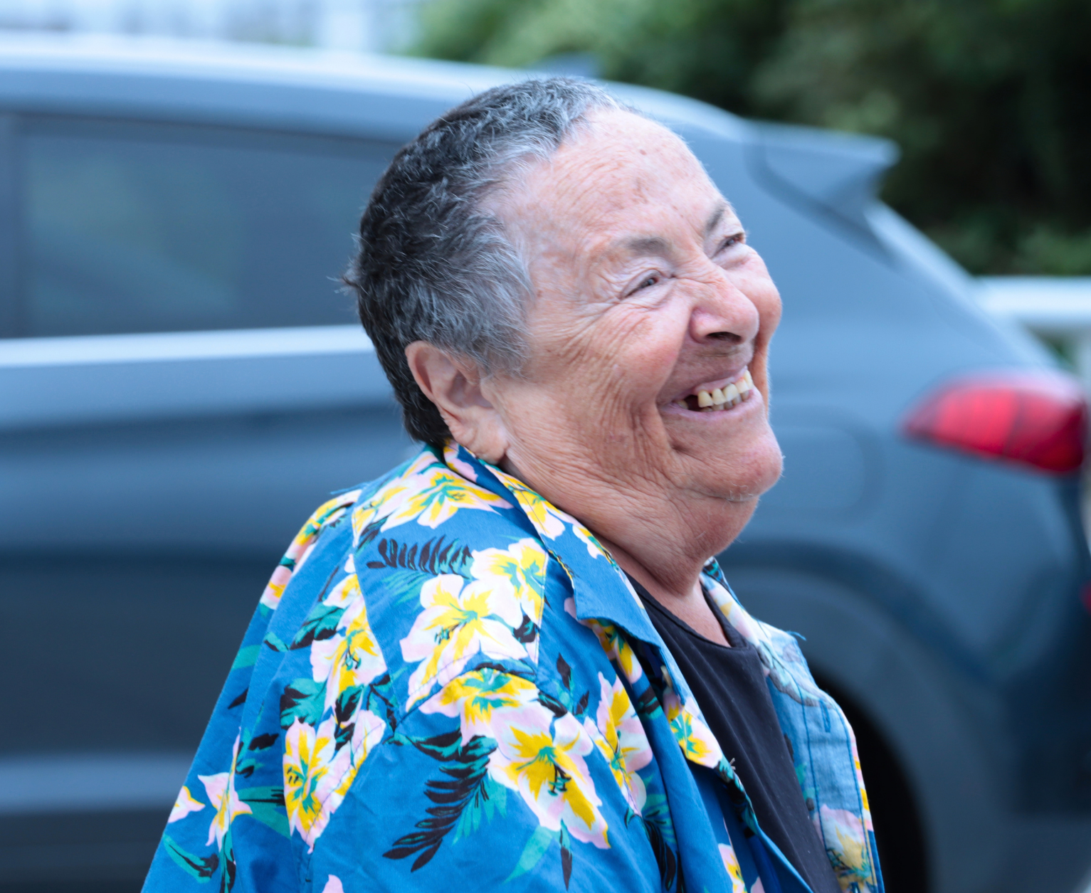 A smiling older adult client