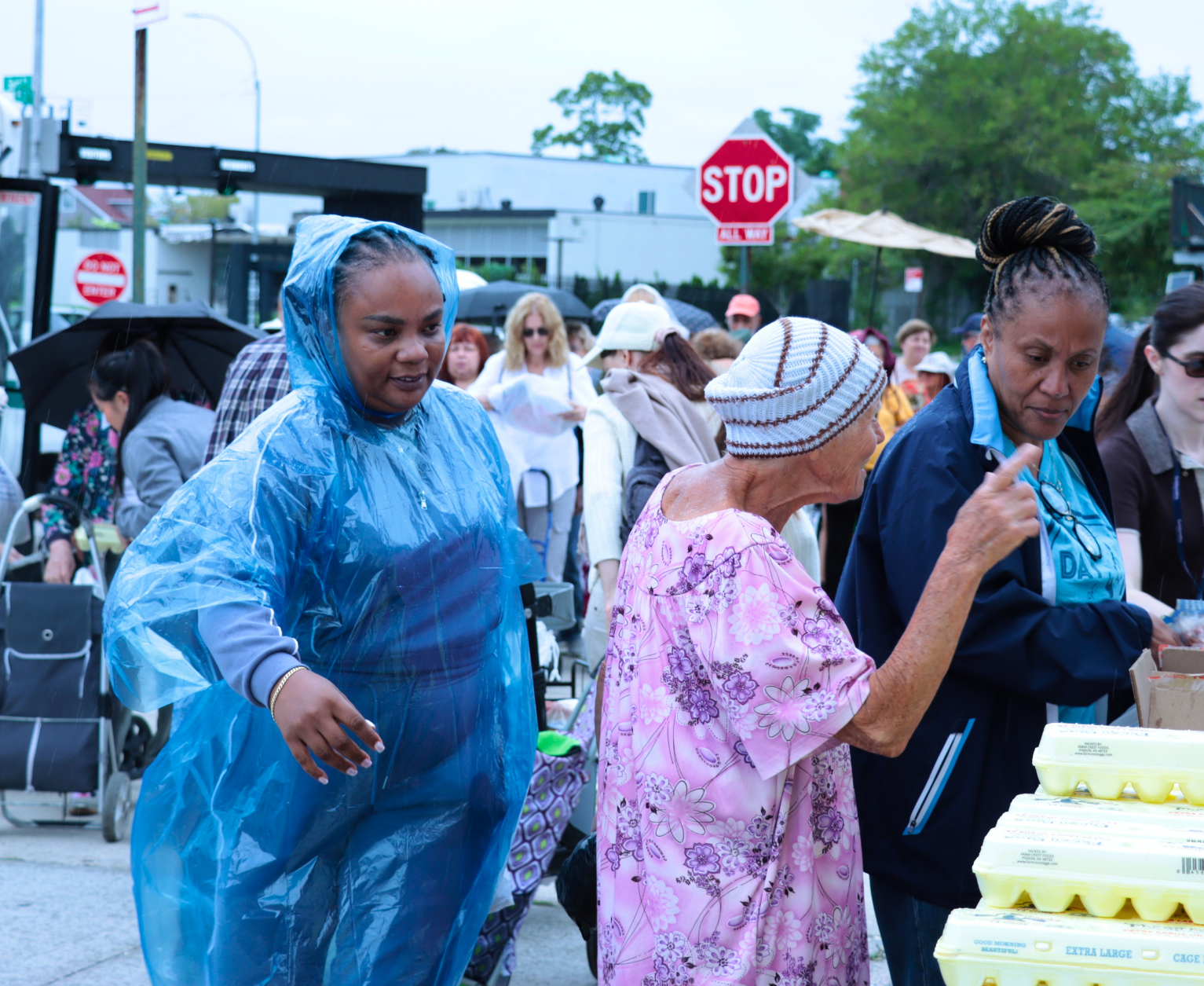 Rain hits the food distribution but the event goes on