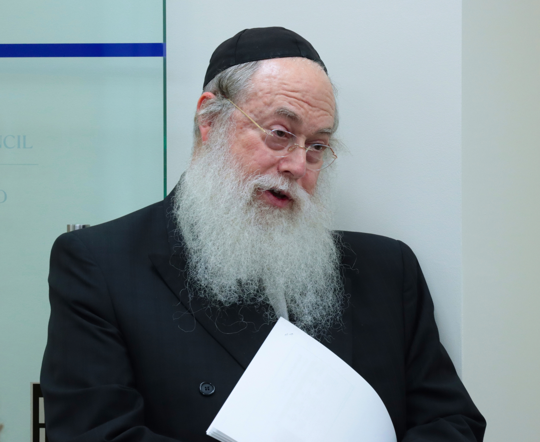Rabbi Wiener speaking to Deputy Mayor Francois