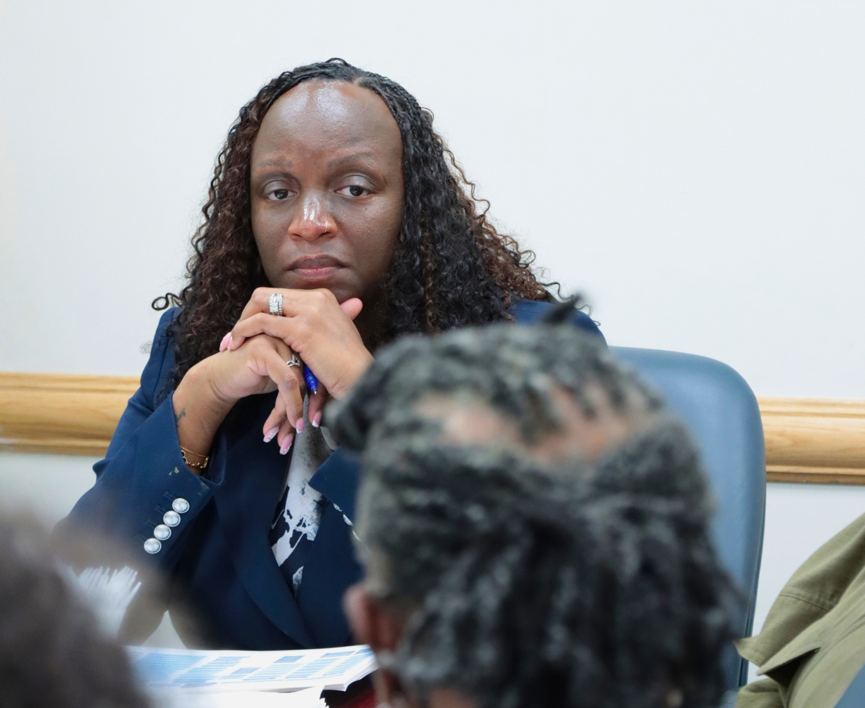 Deputy Mayor Francois hearing from a program director