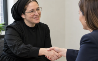 Women shaking hands