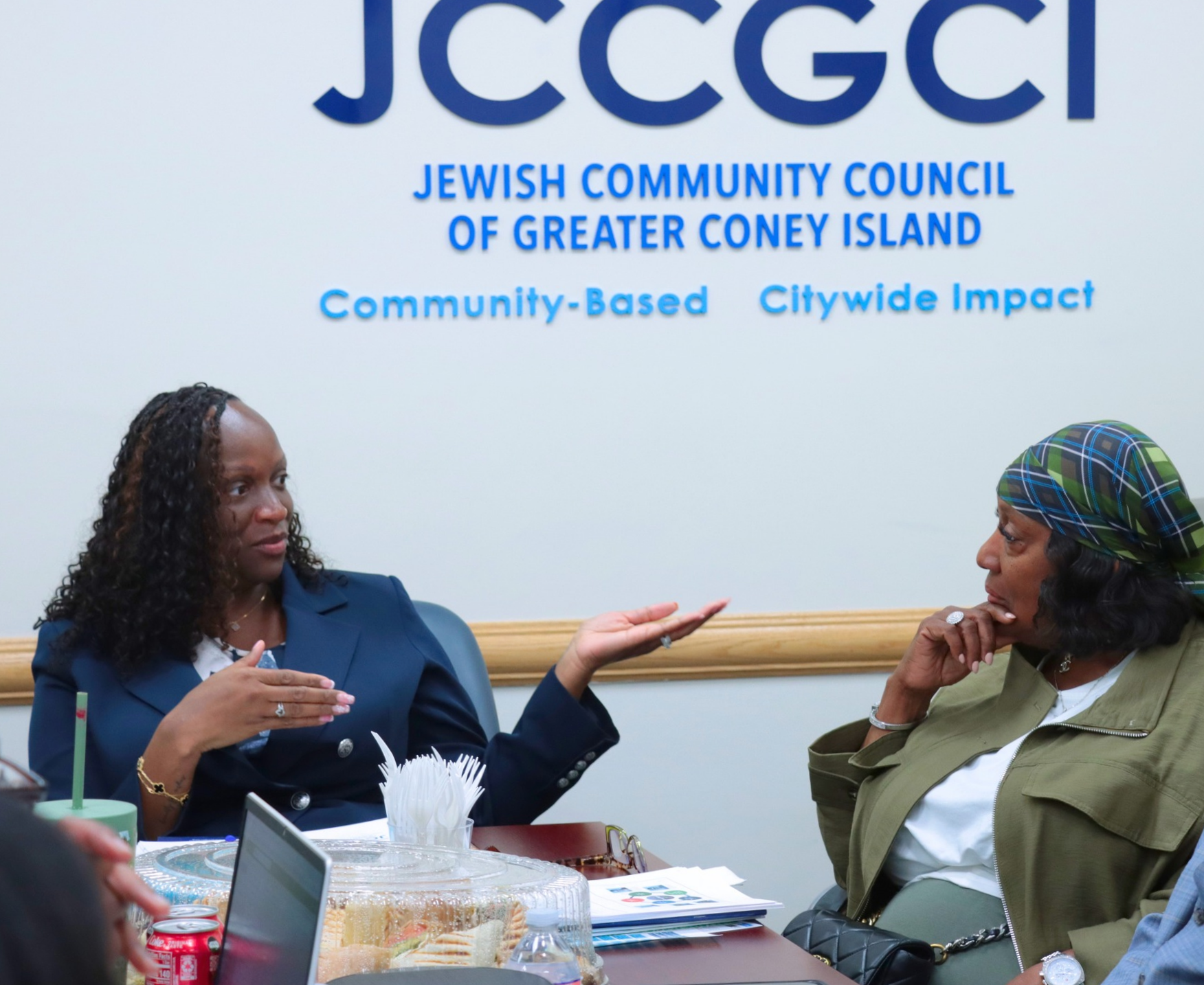 Deputy Mayor Francois speaking to a program director